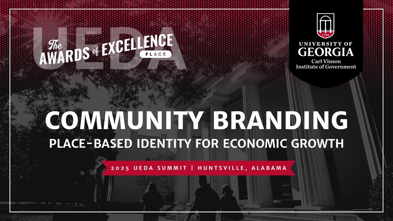 Presentation opening slide, with UEDA awards logo and the words